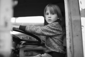 child-sitting-in-truck